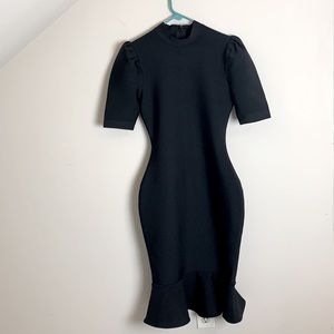 Black bodycon ruffle hem dress